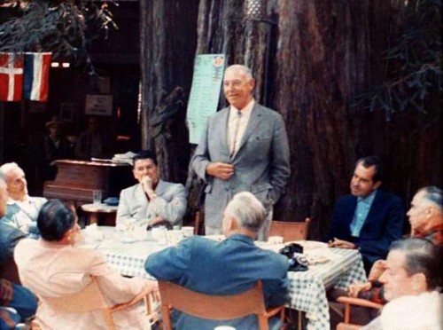 Two future U.S. presidents, Ronald Reagan and Richard Nixon, are pictured with Harvey Hancock (standing) and others at Bohemian Grove in the summer of 1967. 