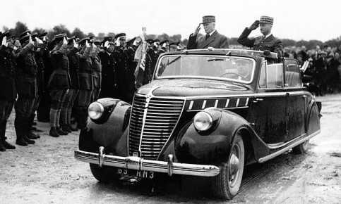 Marshal Pétain (on the left in the car) during an inspection of Segry camp near Chateauroux, in Vichy, France, 1942. Photograph: Hulton-Deutsch Collection/Corbis